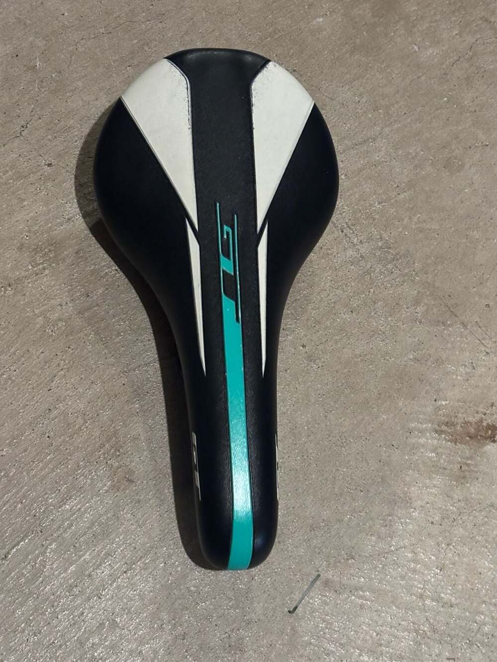 GT Bike Saddle with Black and White Design and Teal Accents